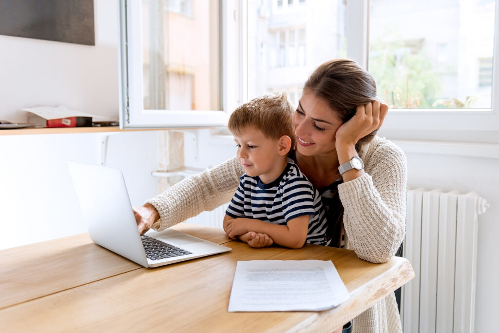 Young mother working from home