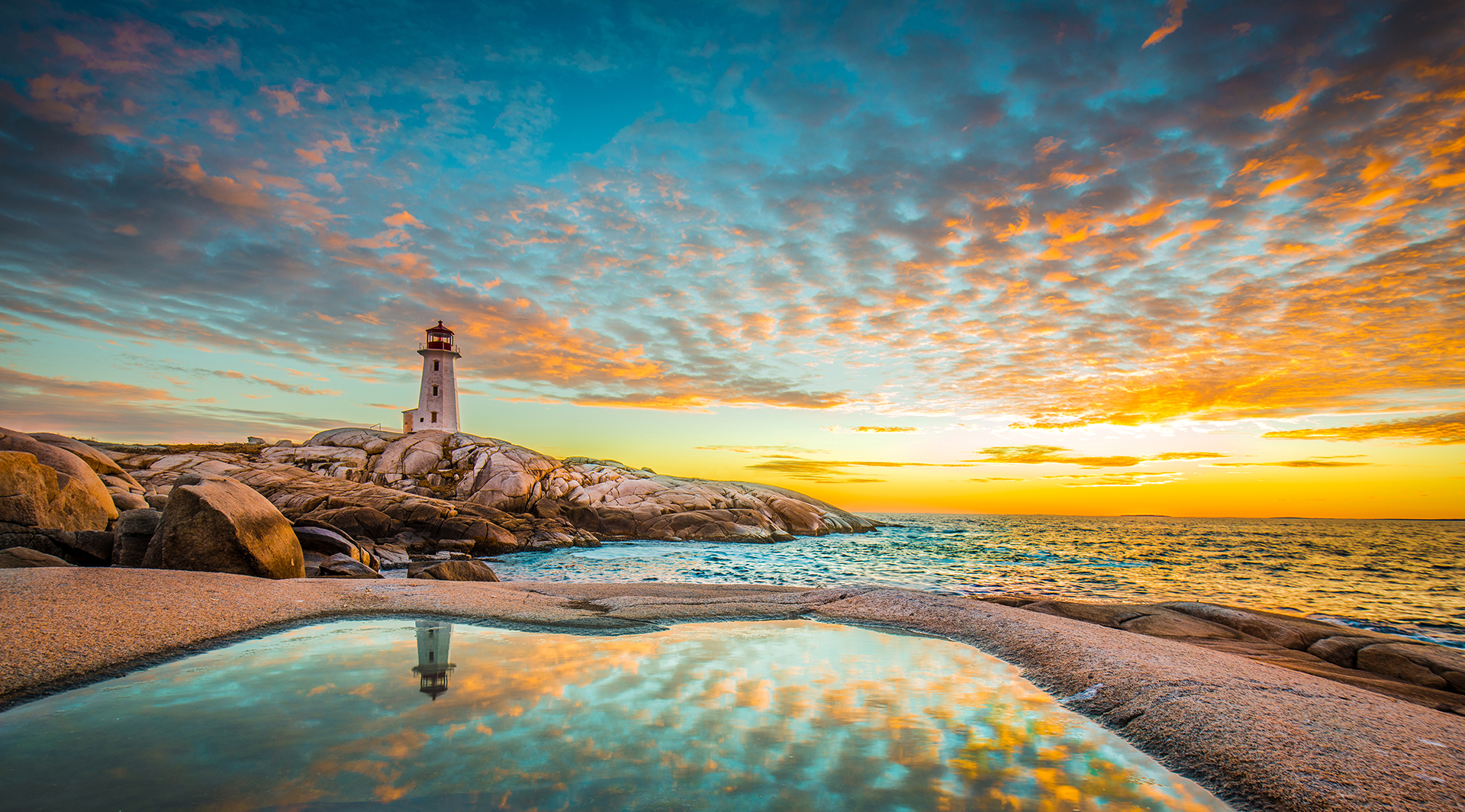 Peggy's cove lighthouse sunset ocean view landscape in Halifax, Nova Scotia