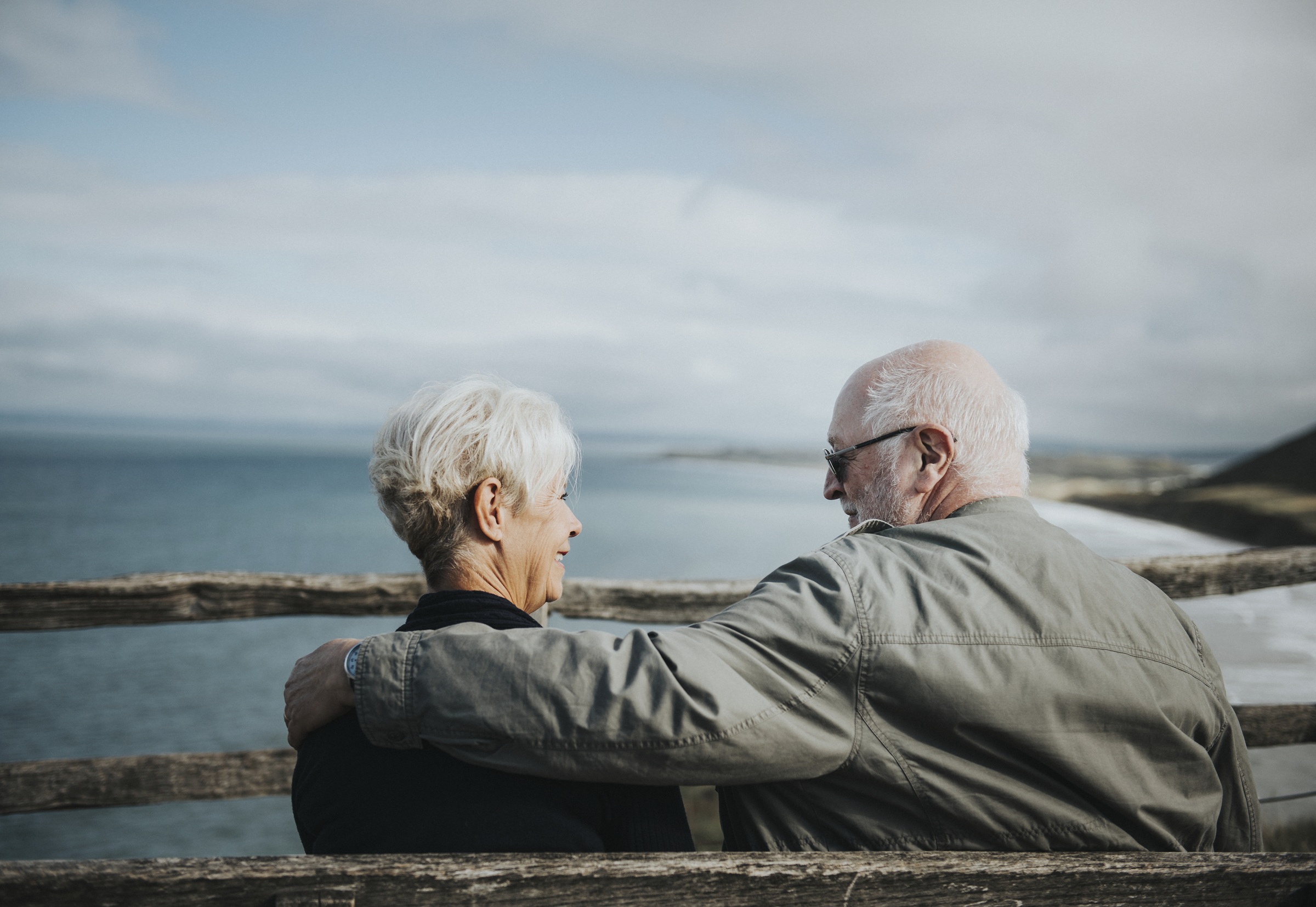 Senior couple enjoying the view of the ocean